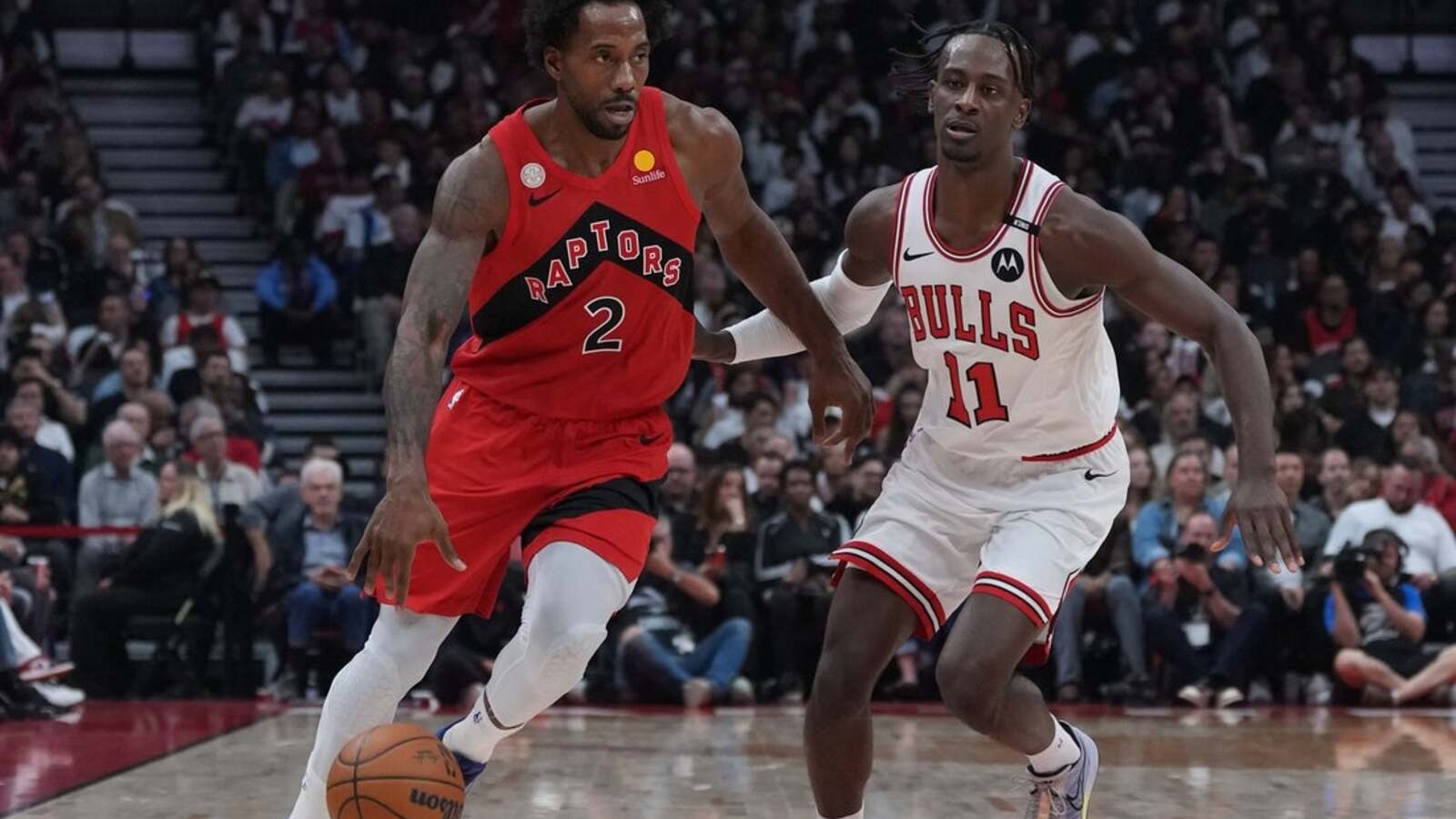 Raptors open season with romp past Bulls