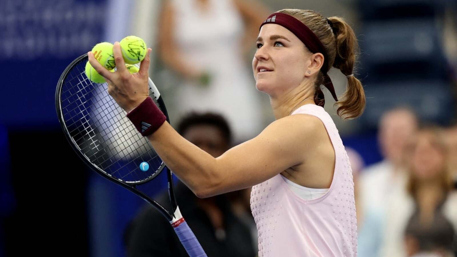 Karolina Muchova slides past Naomi Osaka in Beijing