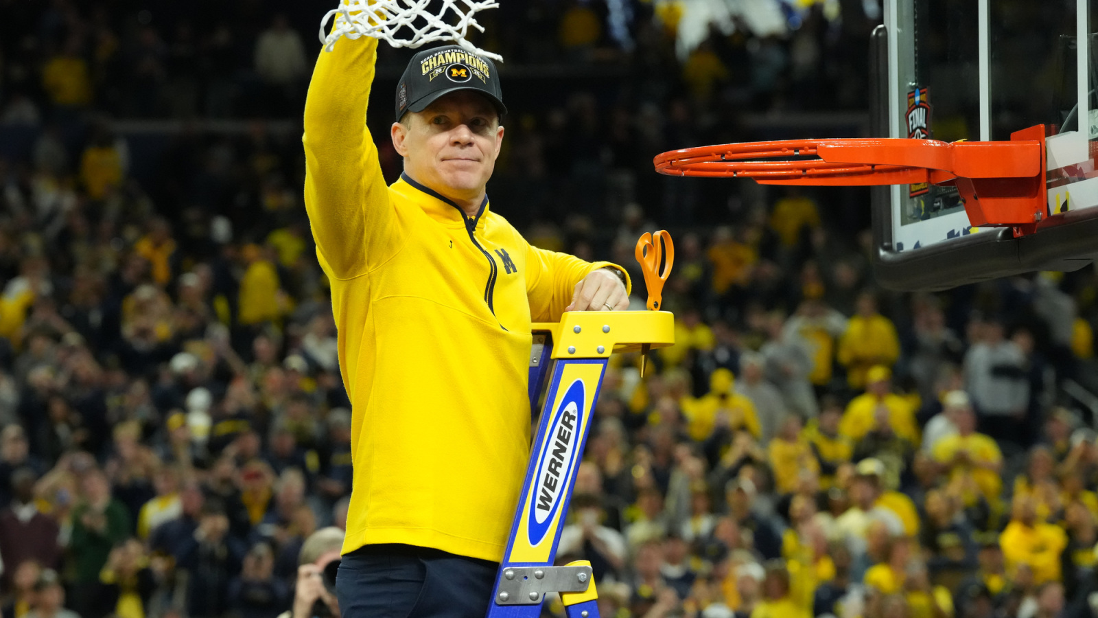 https://www.yardbarker.com/media/8/f/8f76cc6af86d8378a63950982a8fec16f846cec0/thumb_16x9/apr-6-2026-indianapolis-usa-michigan-wolverines.jpg?v=1