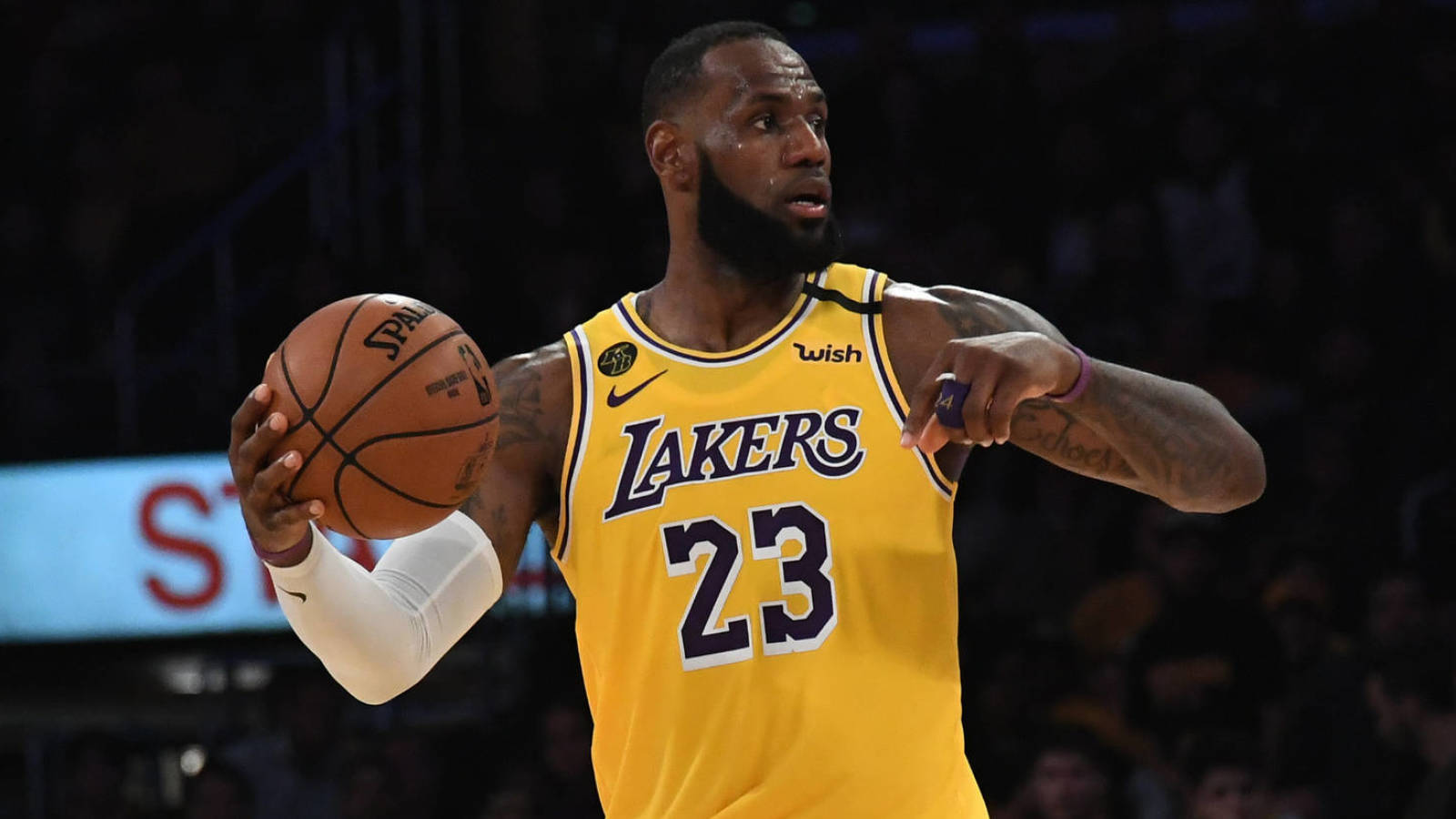 Lebron james holding lakers jersey store