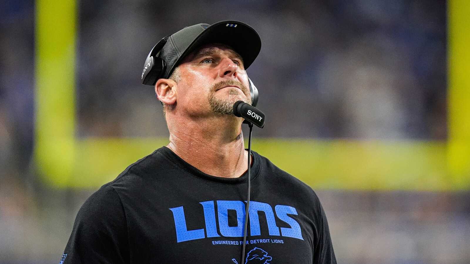 https://www.yardbarker.com/media/a/4/a4bc952c5a6dc20af1304a71c41502e0c9803778/thumb_16x9/detroit-lions-head-coach-dan-campbell-watches.jpg?v=2