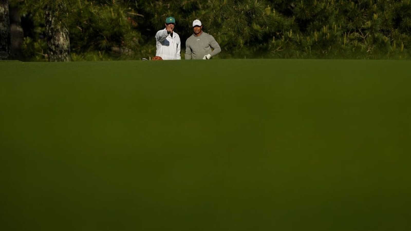 Tiger Woods wraps first round just inside cut line, Masters streak in