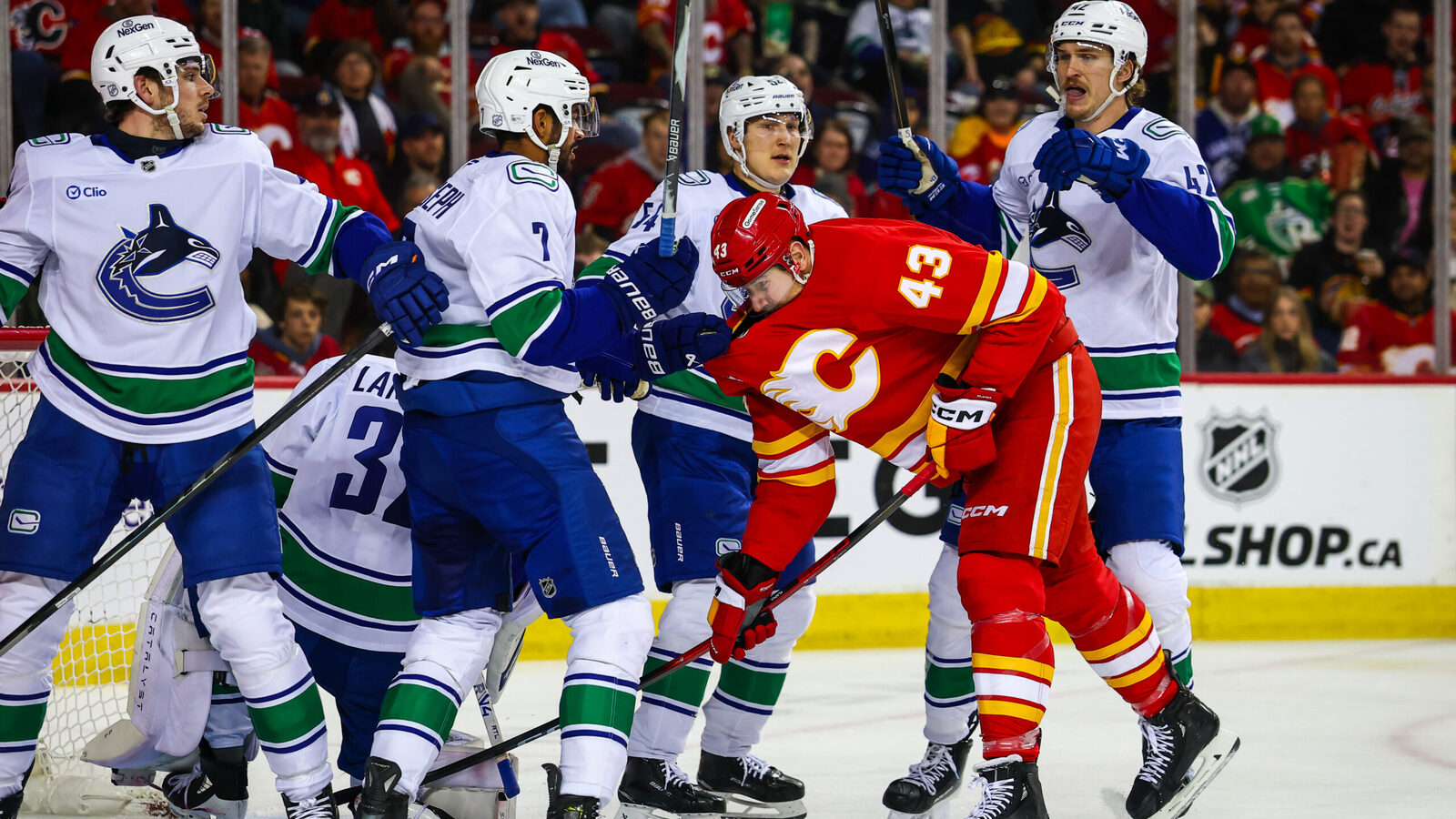 Would the Canucks consider swapping first round picks with the Flames?