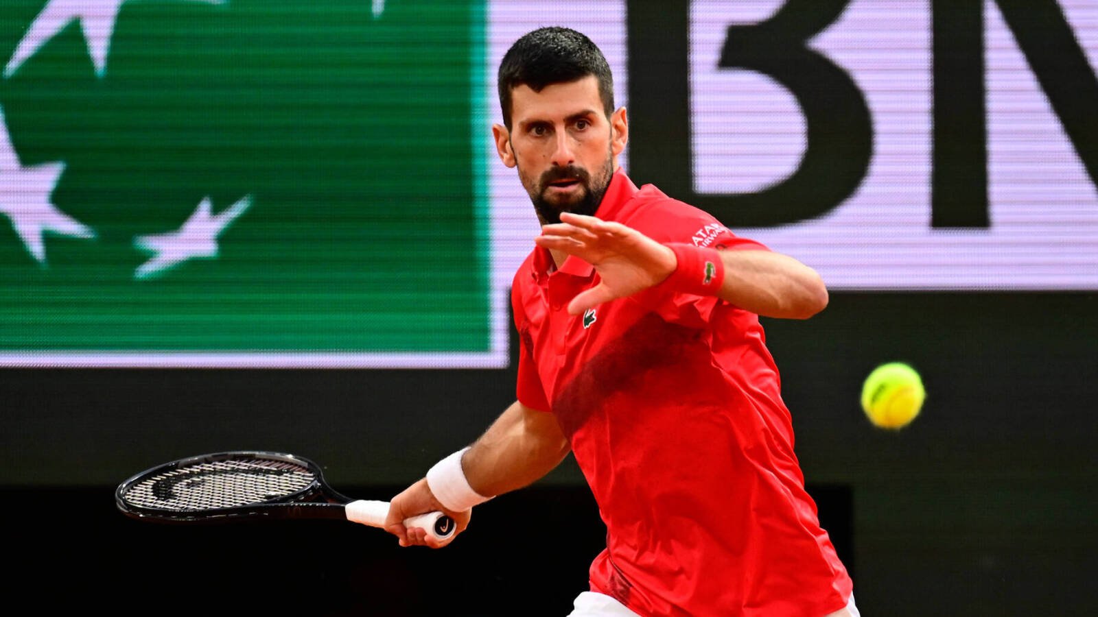 https://www.yardbarker.com/media/b/3/b3ae2d604e55db890230fa3ab898b6f732cd126c/thumb_16x9/watch-novak-djokovic-advances-french-open-semis.jpg?v=1
