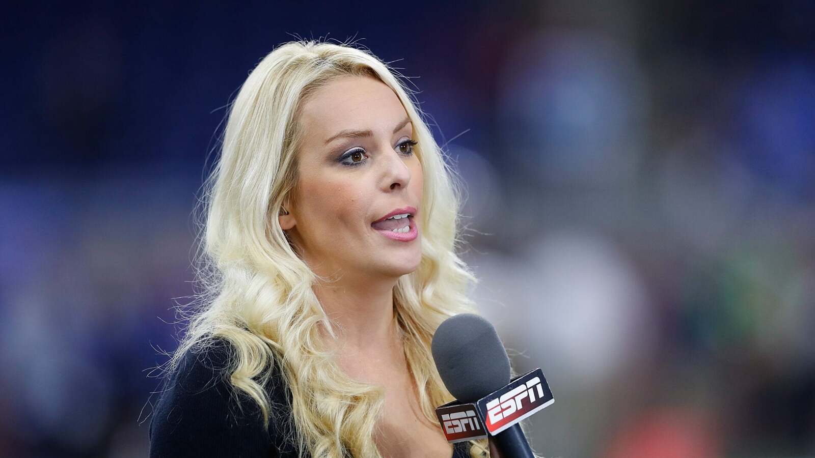 Trump staffer Britt McHenry caught on video throwing drink at fan during Wizards game