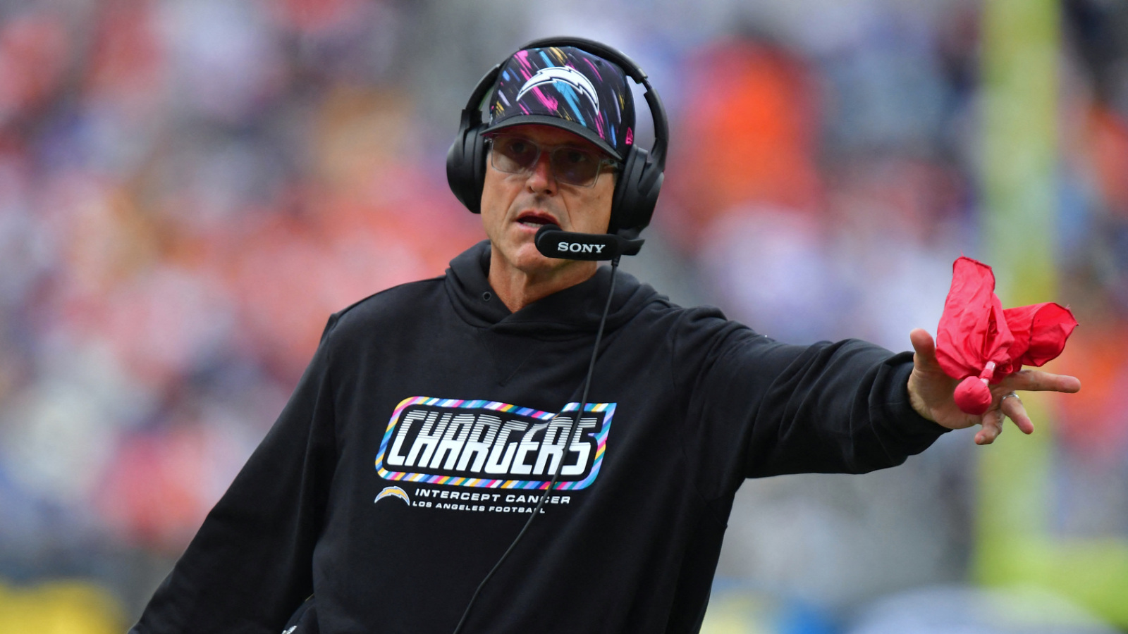 Biff Poggi Supports Jim Harbaugh Amid Chargers' Winless Start