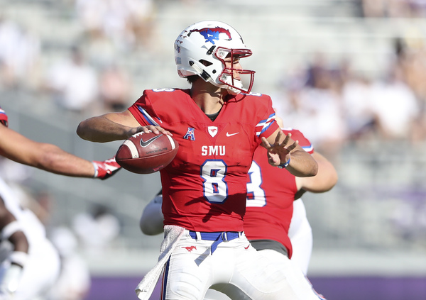 Red white and blue football uniforms 2025