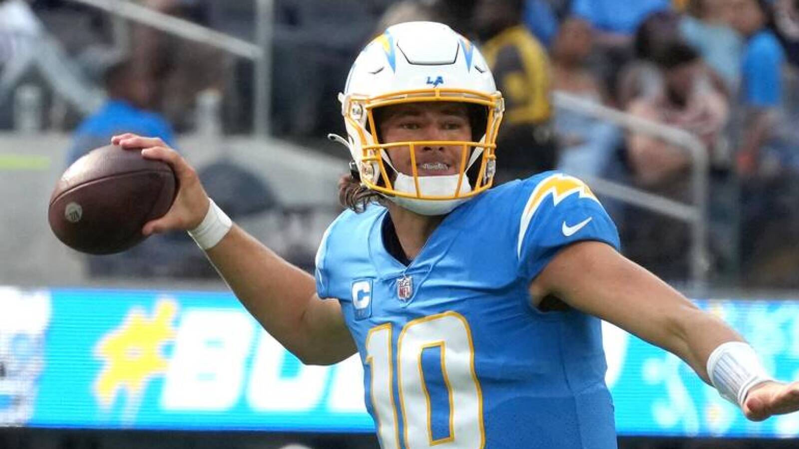 Chargers HC Staley criticized for playing injured Herbert Yardbarker