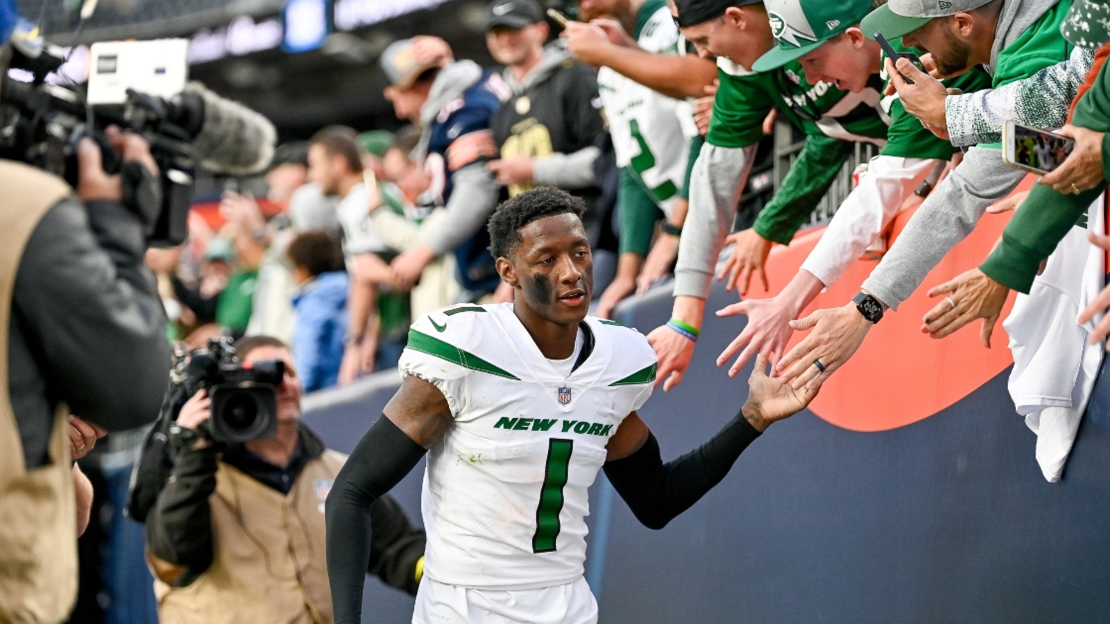 Sauce Gardner shows off his NFL rookie of the year trophy after finally