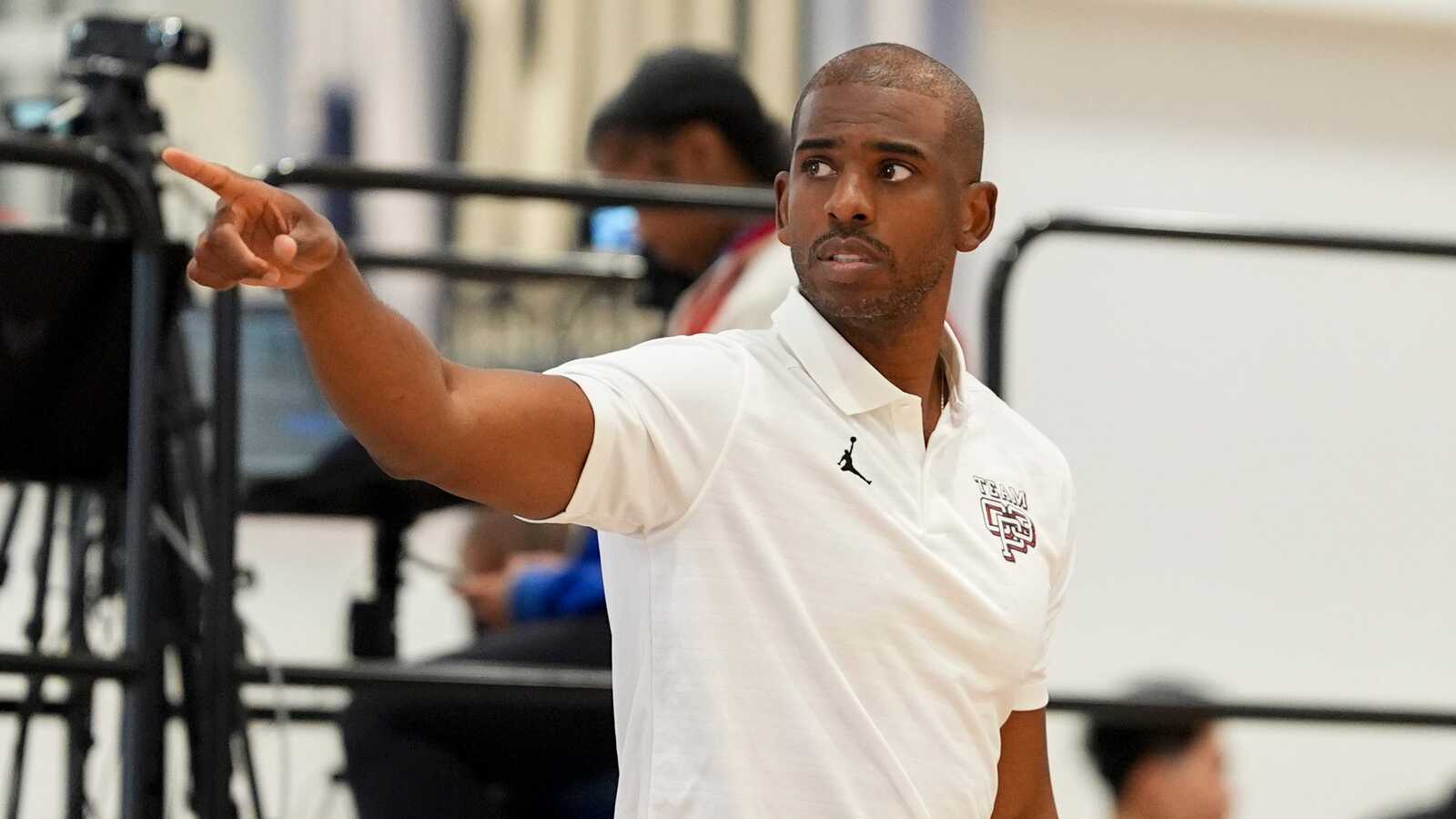 https://www.yardbarker.com/media/c/a/ca0d74b26ed6e1bdb686a01b921f64b5c13e1393/thumb_16x9/nba-player-chris-paul-looks-on-as-team-cp3-plays.jpg