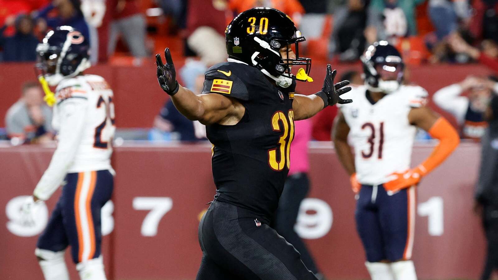 Austin Ekeler Reflects on Bears' Past While Highlighting Future Under Ben Johnson