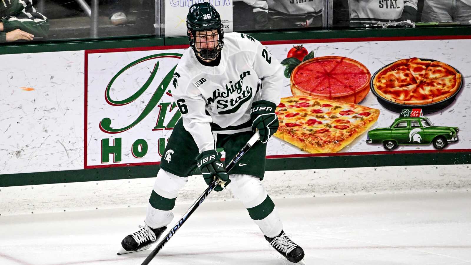 https://www.yardbarker.com/media/c/c/ccce6a13497dd3e1627d9576b321927bea4656d1/thumb_16x9/michigan-states-eric-nilson-controls-puck-against.jpg