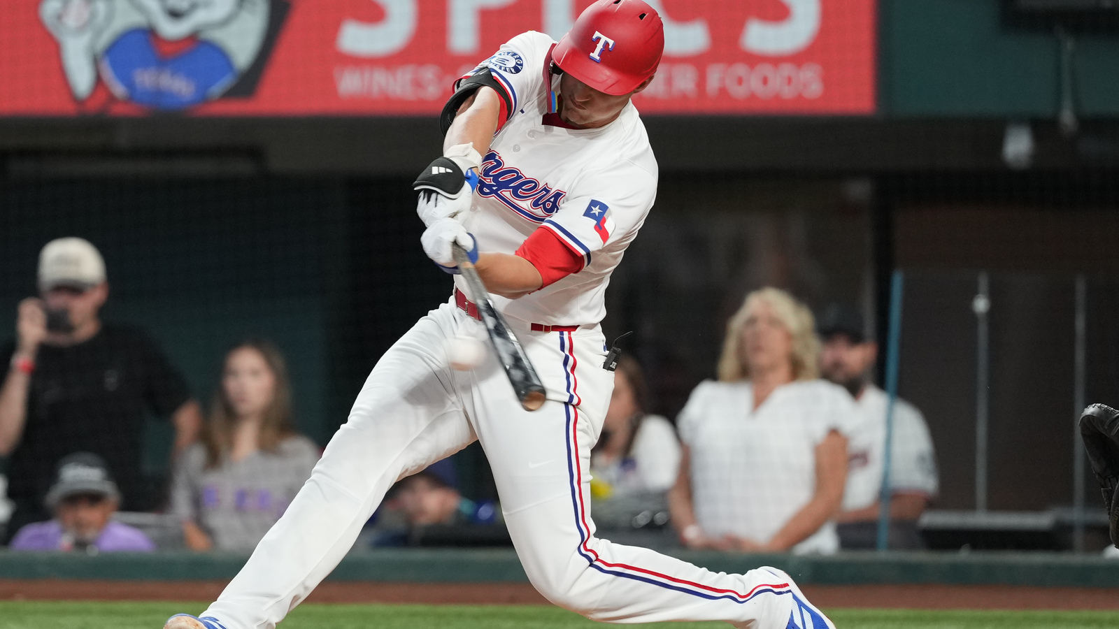 Cory Seager swings big against the Detroit Tigers during the fifth inning at Globe Life Field.