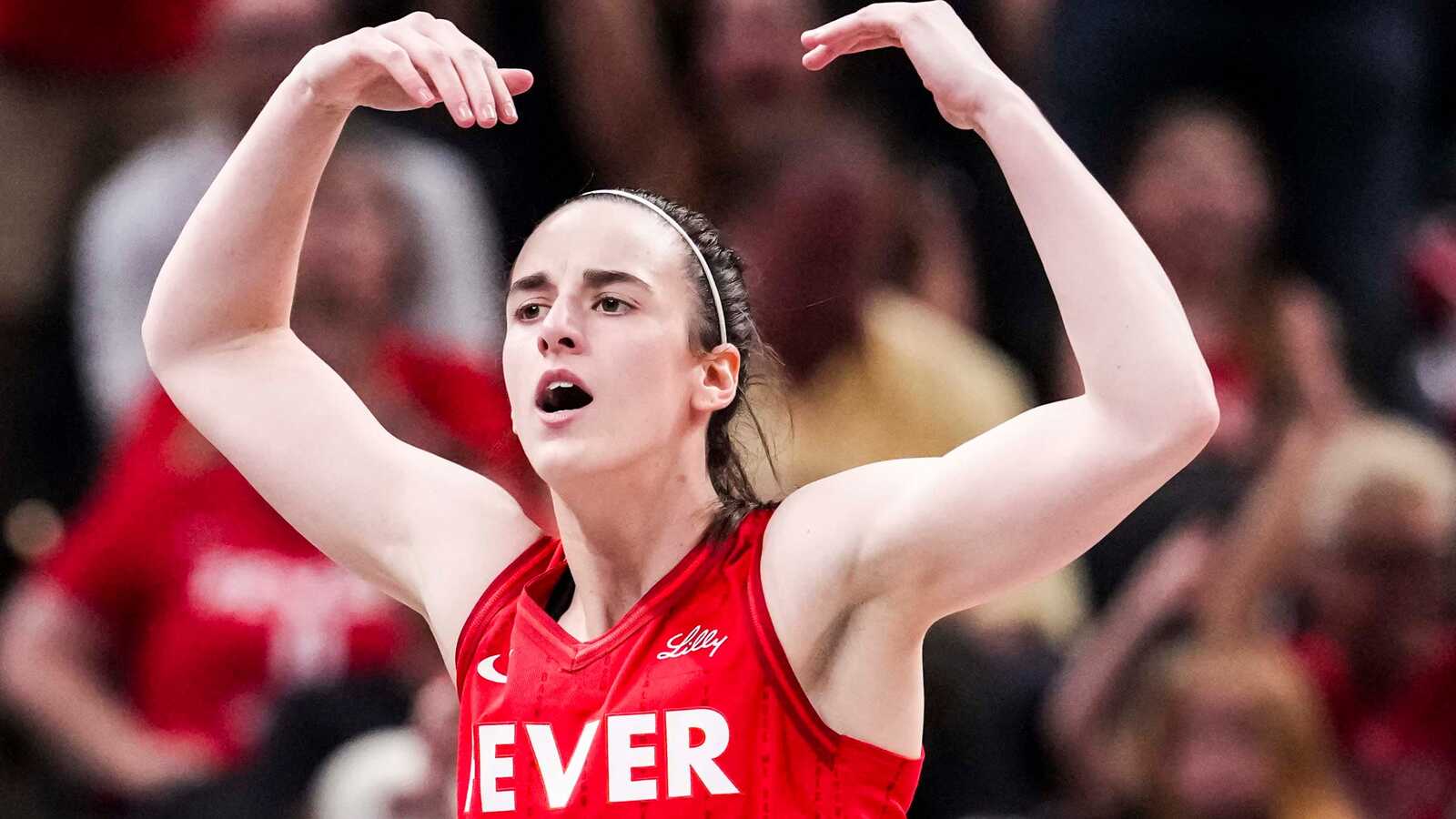 https://www.yardbarker.com/media/e/1/e132c9821297fc0287c671b854226cfb745ece1c/thumb_16x9/indiana-fever-guard-caitlin-clark-22-gets-crowd.jpg