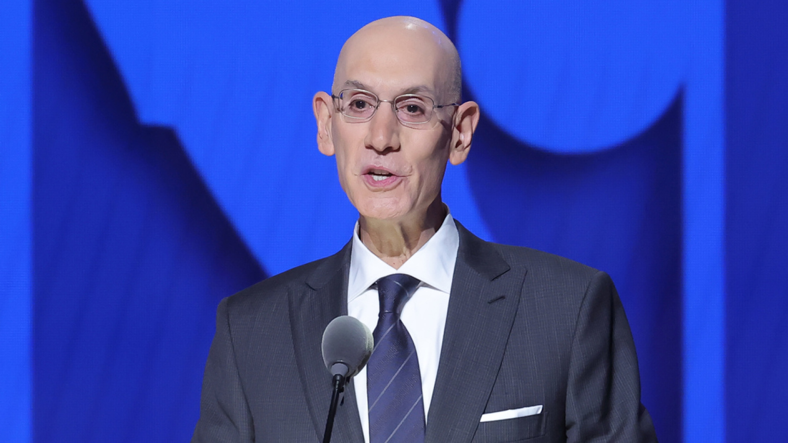 https://www.yardbarker.com/media/e/9/e93ca45987c19d1a88f44c9f253a133d1b931d4c/thumb_16x9/deeply-disturbed-adam-silver-reacts-federal.jpg?v=1