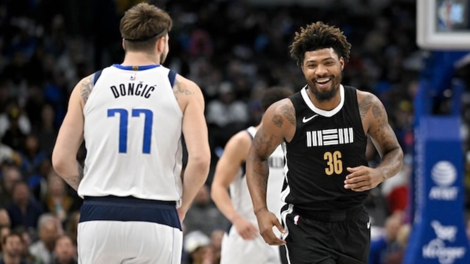 https://www.yardbarker.com/media/e/b/eb0bc06a1628454585a6ad0d3efe0f6990b7975a/thumb_16x9/Luka-Doncic-Marcus-Smart.jpg