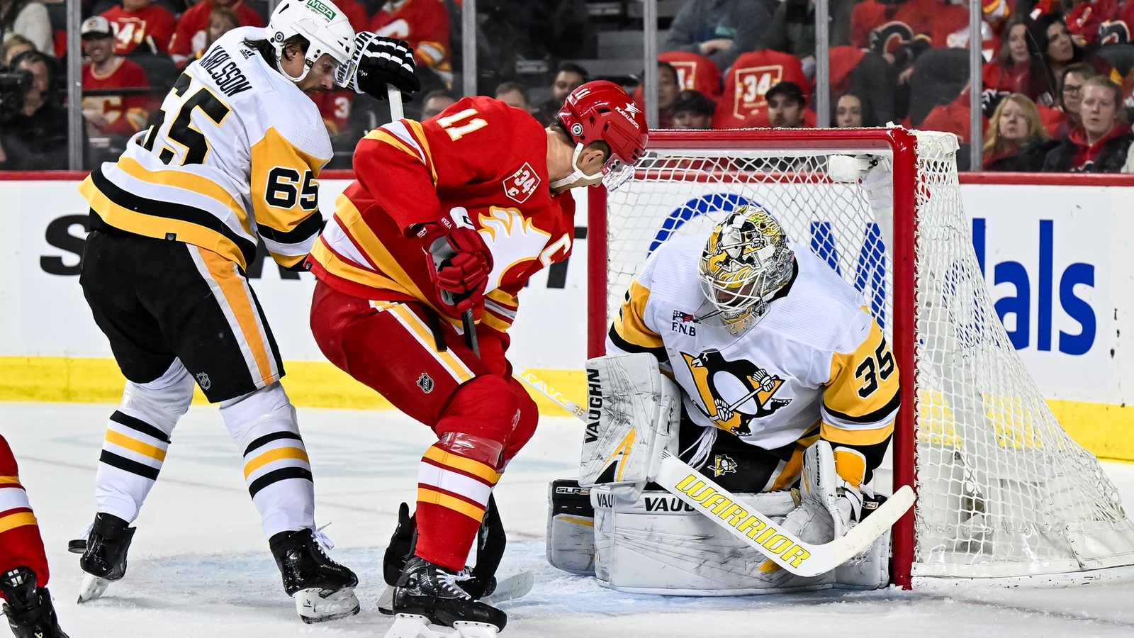 Flames extend streak to five games with comeback win over Penguins ...
