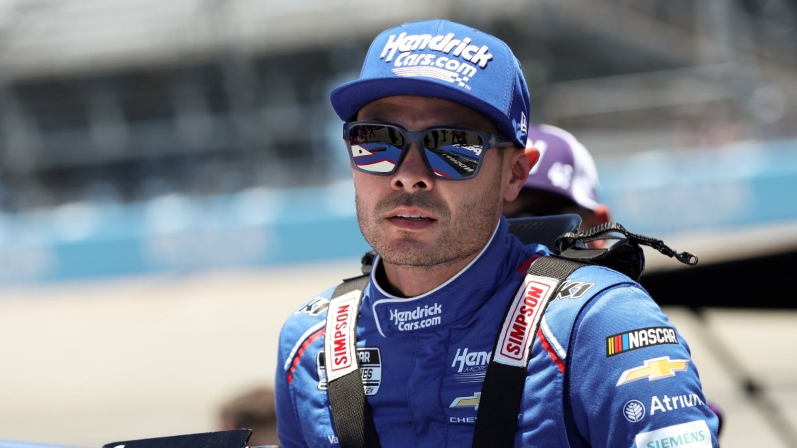 Kyle Larson explains challenges of performing burnout on aircraft carrier for NASCAR 26 game cover