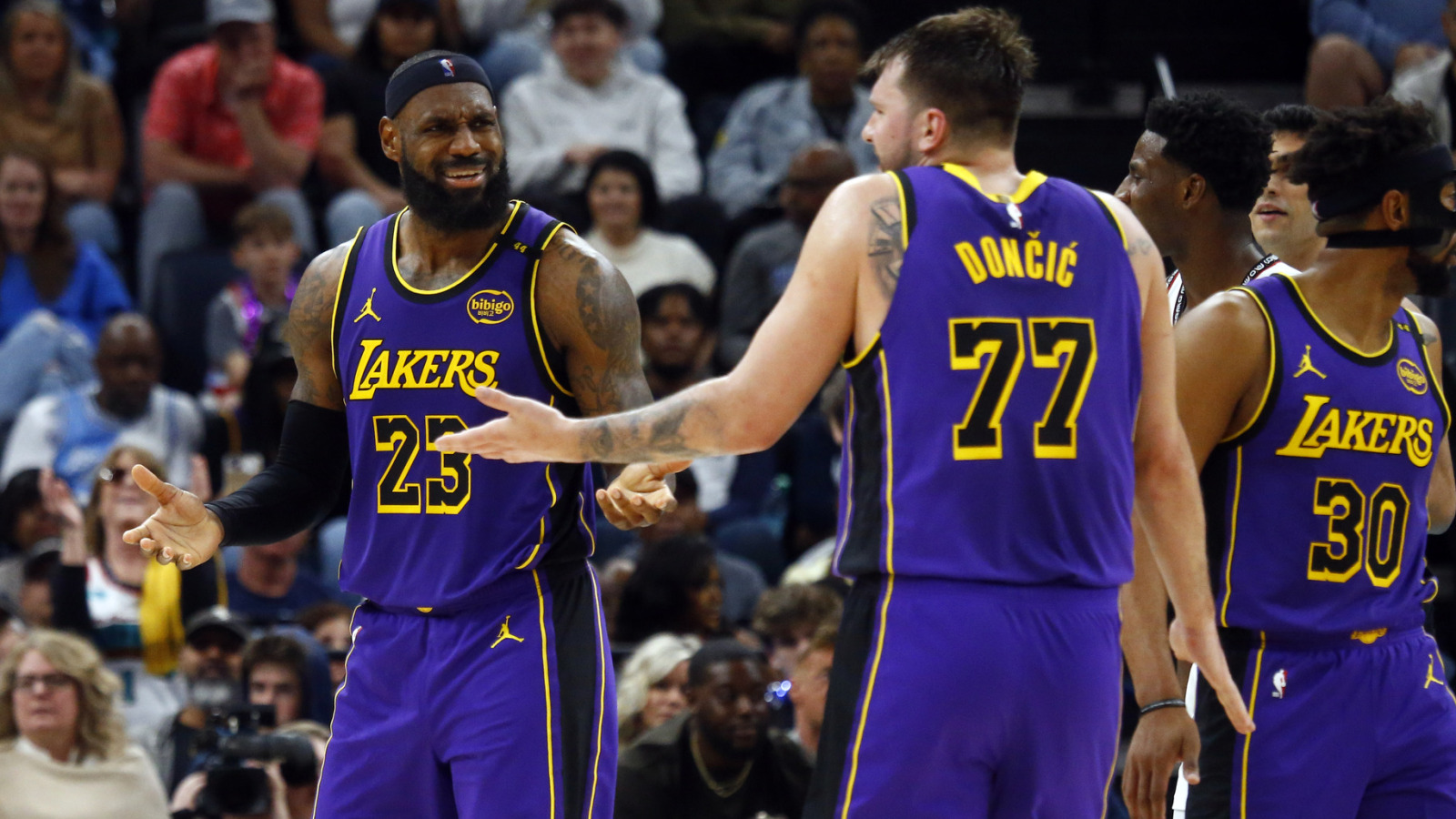 LeBron James, Luka Doncic recreate iconic basketball photo | Yardbarker