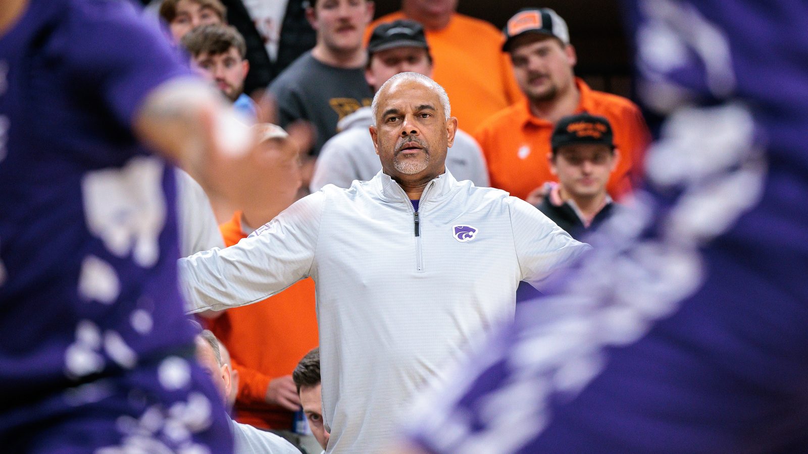 Jerome Tang celebrates Kansas State’s win by dancing with fans