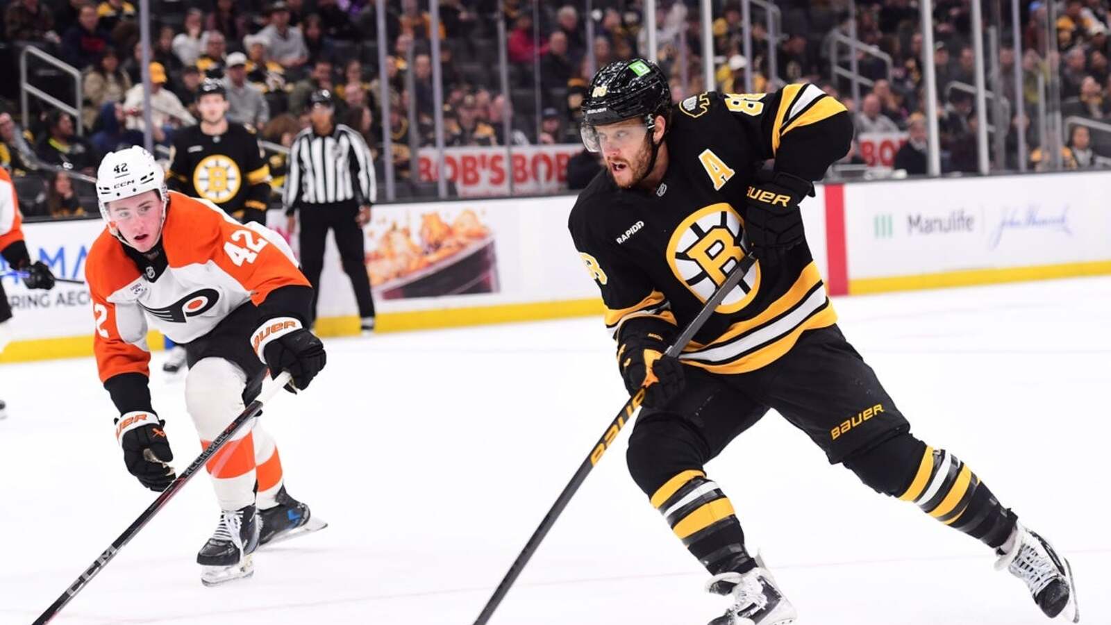 Out to build on playoff berth, Bruins open vs. revamped Rangers