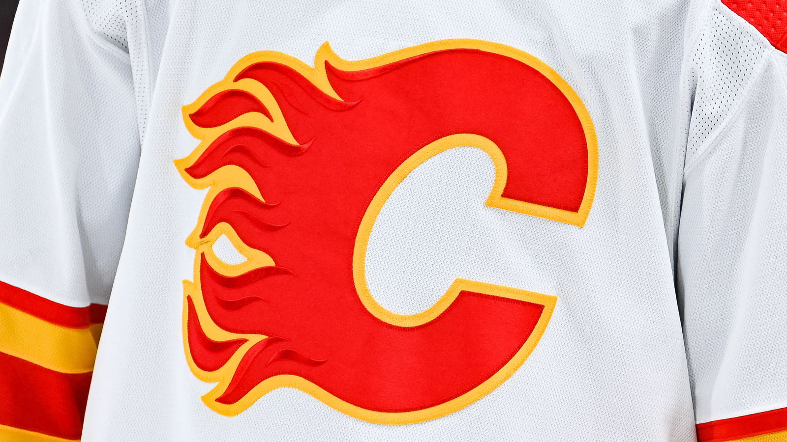 Who are the 9 try-out players coming to Flames prospects training camp?