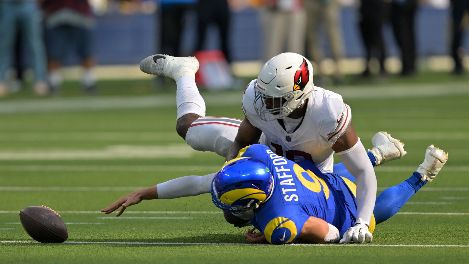 Which teams are looking to get Cardinals’ Josh Sweat before the trade deadline?